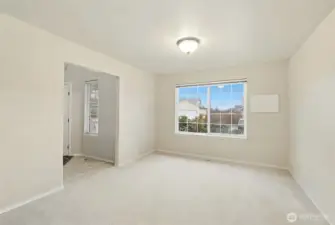 **this room (dining room) is currently used as an interim office and is in the process of being packed.