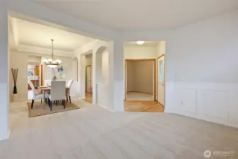 A spacious family room, perfect sitting room, or whatever you need! Straight ahead you will find the home office.