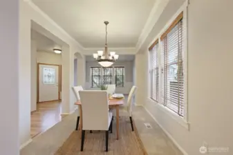 Beautiful formal dining room with plenty of space for everyone! Turn around and find the butler's pantry leading to the kitchen.