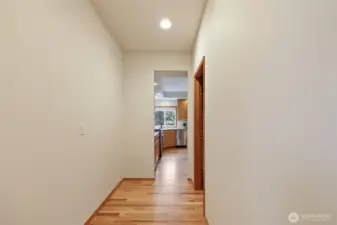 Spacious butler's pantry area! Furnish this room to suit your needs! Coffee bar, cocktail bar, additional storage, the list goes on! Door on right is the walk-in pantry.