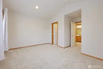 This bedroom includes a spacious walk-in closet, and right across the hall is the full bathroom.