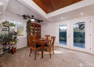 French doors lead out to the front and front patio