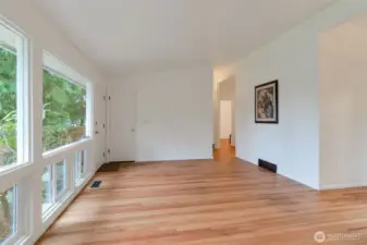 Living Room with floor to ceiling windows.