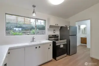 Half Bath in the background.