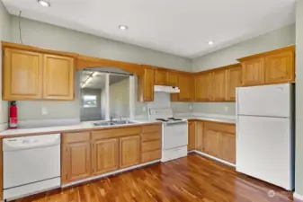 Kitchen in the 1 Bedroom Apartment. Window overlooks horse stalls below.