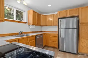 There is a lot of cabinet and counter space (brand new counters) as well as pantry storage.