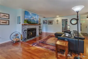 Custom Wood-Burning Fireplace Is The Centerpiece Of This Open Space!