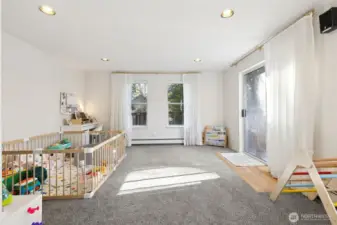 Cozy family room off of the dining area. Sliding glass door takes you to the gated back porch