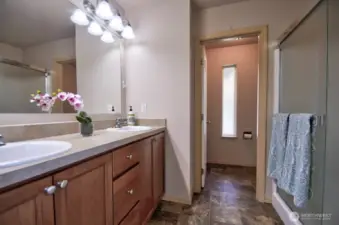 Primary bathroom with separate toilet room. Large walk-in shower