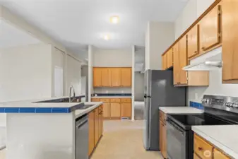 Stainless appliances round out this fabulous space and the door on the left is a closet that could make a great pantry for your dried goods!