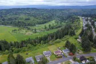 On clear days, Mount Rainier shines from almost every room in this one-level home. They say, 'Live Like the Mountain Is Out' and here that's a natural way of life!
