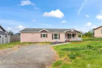 Affordable one-level living at its finest. Enjoy a covered porch and plenty of off-street parking for you and guests. Avid gardener? There is plenty of space for some garden beds or fruit trees here!
