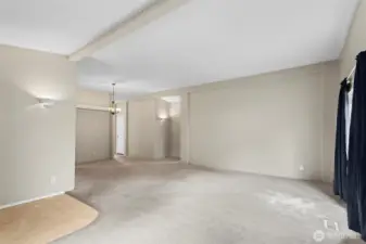 Enter in to this large living room with vaulted ceilings and plenty of natural light. Add some new carpet and paint and this home will shine!
