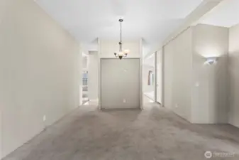Easy flow through the formal dining space right into the kitchen and family room.