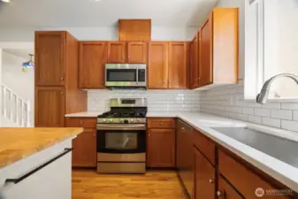 Another view of the kitchen with the 4 burner gas range.
