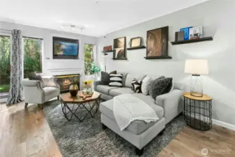 Welcome to Sundance at Klahanie - a charming, updated, one-bedroom condo that checks all the boxes. Convenience meets comfort, with accessible parking right outside your single-level condo. Trails, parks, swimming pools, pickle ball, shopping and dining - all close by. Hop on I-90 and arrive in Bellevue in just 15 minutes. Or jump on Hwy 202 to Redmond/Microsoft - 7 miles away.Bright and inviting living room with gas fireplace and tranquil greenbelt views- a rare find in Sundance at Klahanie.