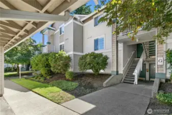 Inviting front entry with a covered patio space, ideal for a welcoming touch and year-round comfort in the Pacific Northwest climate.