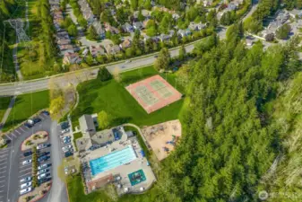 Aerial view of just some of the spectacular Klahanie Community amenities - multiple tennis courts, playgrounds, two club houses and two swimming pools.
