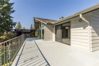 Entertainment-sized deck has plenty of room for lounging, dining and gardening (drip irrigation is already in place!)