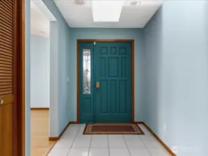 Entry is always beaming with natural sunlight from the skylights