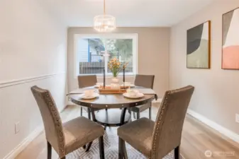 Formal Dining space great for hosting! Can fit a much larger table!