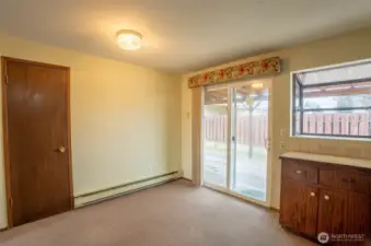 kitchen with pantry and access to rear patio