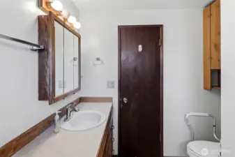 3/4 bath in hall between 3 bedrooms