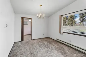 dining area in front of home, open to living room