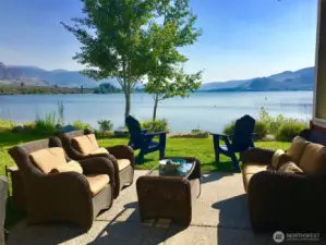 Comfy Wicker furniture on patio just steps from the Lake.   Did you know that Lake Osoyoos is known one of the best swimming & boating lakes in the Pacific Northwest