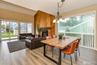 Tons of natural light in the main living area with double sliders leading to the deck and expansive windows.  Virtually staged.