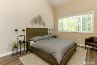 Guest room with vaulted ceilings, virtually staged
