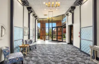 Secure lobby entrance with elevator.