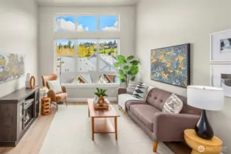 Open great room flooded with natural light and high ceilings