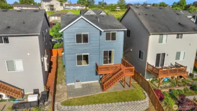 From above, see the inviting backyard—securely fenced and thoughtfully terraced for outdoor enjoyment.