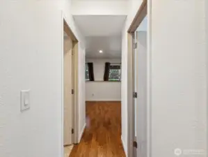 View from bottom of stairs facing towards backyard
