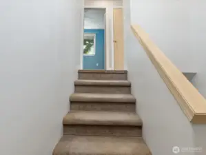 View from foyer upstairs to main level