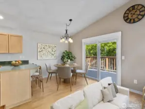 Dining area opens onto large deckspace for outdoor BBQs