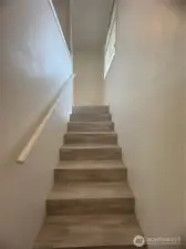 Stairs to primary bedroom