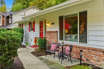 Enjoy your morning coffee on this quaint front porch!