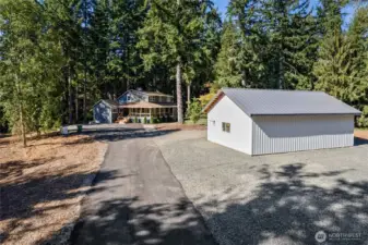 Front View of property w/ detached garage