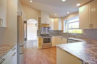 Completely updated kitchen with shaker cabinets, granite counters and stainless steal appliances!