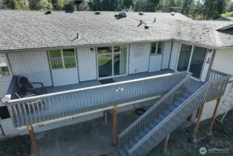 Spacious deck looks out over the back yard. Great for entertaining.