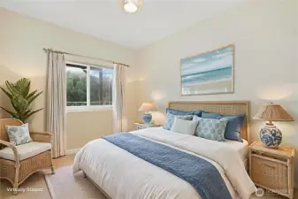 Downstairs bedroom with tall ceilings