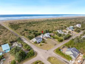 One house down from public beach access road