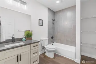 Dining Room w/Built-Ins that perfectly frame the window overlooking the large front yard.