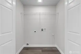 Laundry Closet off the Family Room makes keeping up with Laundry a BREEZE!