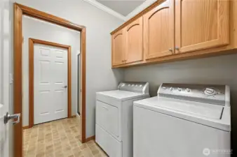 Laundry room with upper cabinet storage