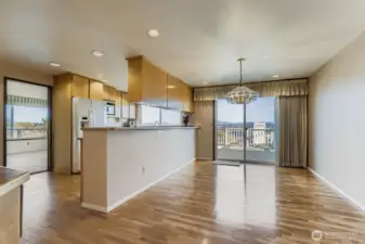 Dining area that opens up to view entertainment deck.