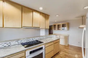 Another view of the kitchen extra cabinets and informal eating area.