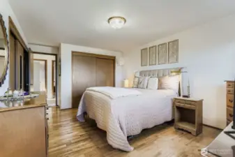 Another view of primary bedroom.  Double closet space.